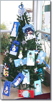 Claiborne Parish Art Students decorated ornaments by painting these canvasses for the Christmas tree at the School Board office in Homer.