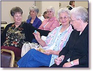 Odessa Roberts holds a winning ticket for one of many Senior Expo door prizes.